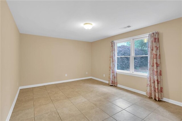 2810 Olde Town Park Dr, Norcross, GA 30071 - unfurnished room featuring baseboards, visible vents, and light tile patterned floors