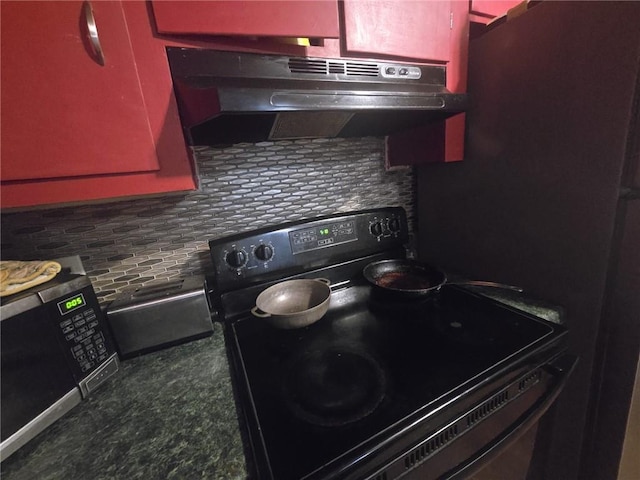 kitchen with black electric range and decorative backsplash