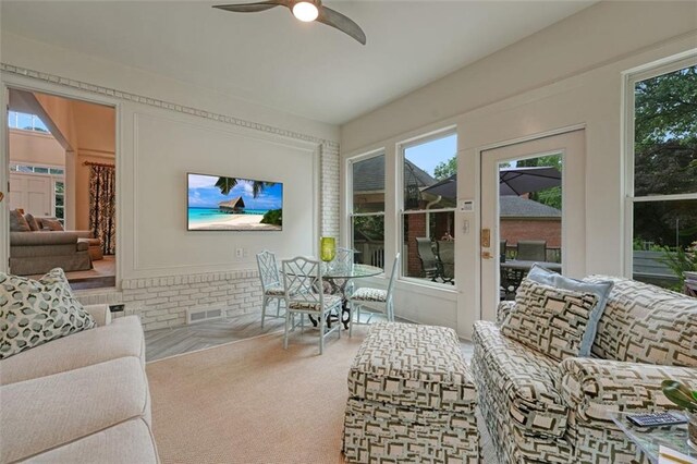 living room featuring ceiling fan