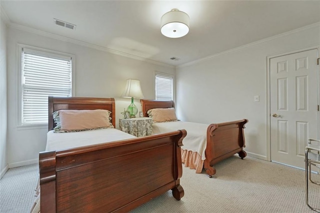 carpeted bedroom featuring ornamental molding and multiple windows