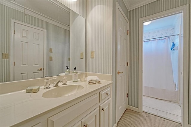 bathroom featuring curtained shower, tile patterned floors, ornamental molding, and vanity