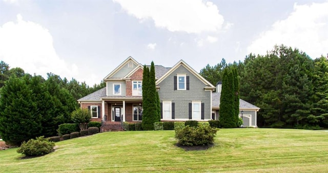 240 Chandler Walk, Loganville, GA 30052 - craftsman-style house with a front lawn and a porch