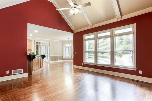 240 Chandler Walk, Loganville, GA 30052 - unfurnished living room with a chandelier, high vaulted ceiling, wood finished floors, beamed ceiling, and a ceiling fan