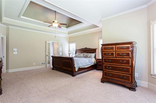 240 Chandler Walk, Loganville, GA 30052 - bedroom featuring ornamental molding, light carpet, a raised ceiling, and a ceiling fan