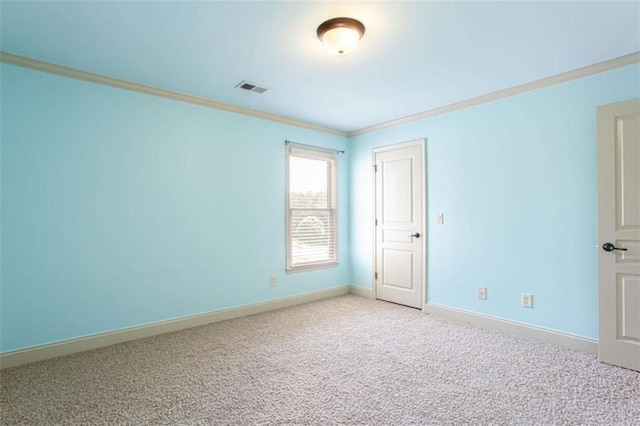 240 Chandler Walk, Loganville, GA 30052 - spare room with ornamental molding and light colored carpet