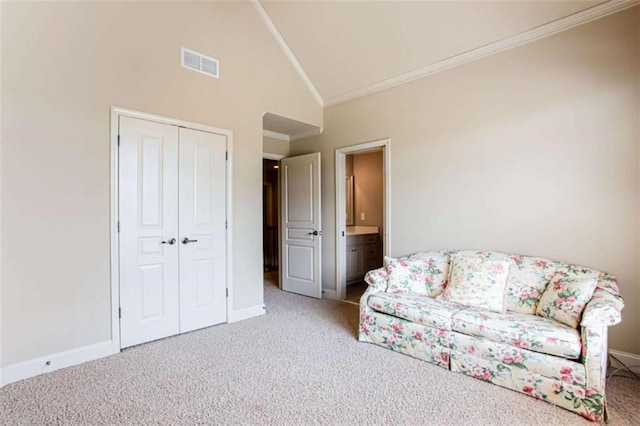 240 Chandler Walk, Loganville, GA 30052 - sitting room featuring carpet floors, crown molding, and vaulted ceiling