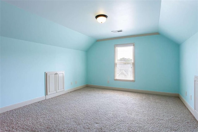 240 Chandler Walk, Loganville, GA 30052 - bonus room featuring vaulted ceiling and light colored carpet