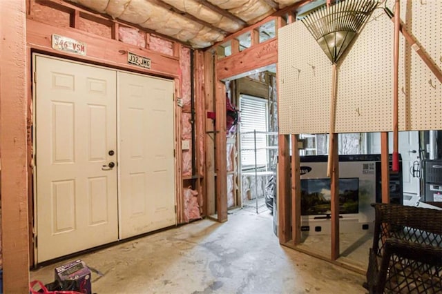 240 Chandler Walk, Loganville, GA 30052 - miscellaneous room with unfinished concrete floors