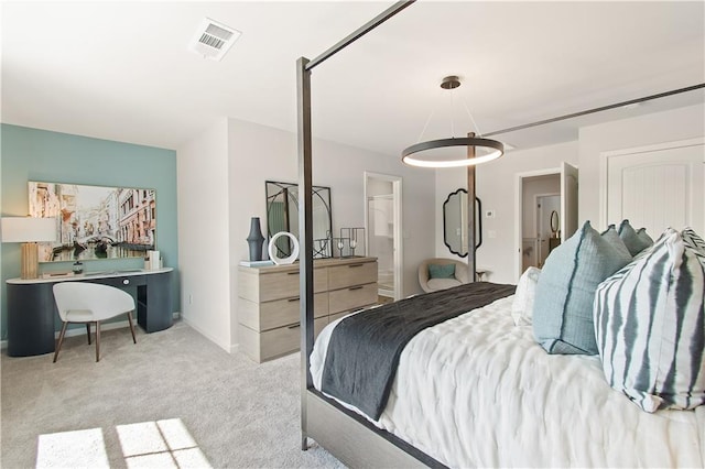 bedroom featuring light colored carpet