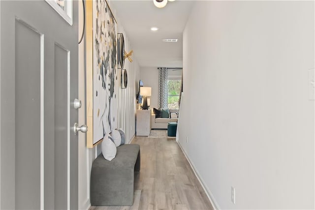 hall featuring light hardwood / wood-style floors