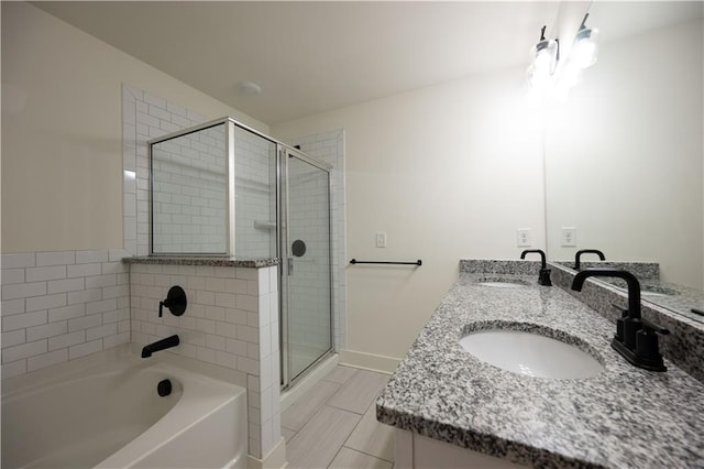 bathroom with vanity and an enclosed shower