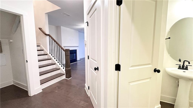 hallway featuring sink