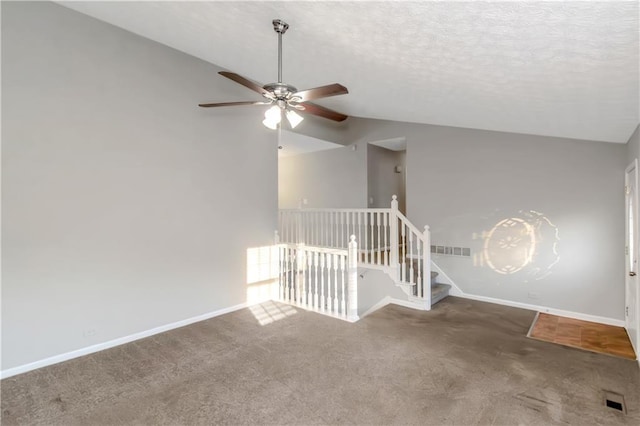 97 Spring Leaf Dr, Dallas, GA 30157 - carpeted spare room with visible vents, baseboards, vaulted ceiling, and a ceiling fan