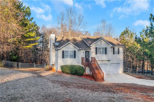 97 Spring Leaf Dr, Dallas, GA 30157 - view of front of property featuring an attached garage, a chimney, concrete driveway, and fence