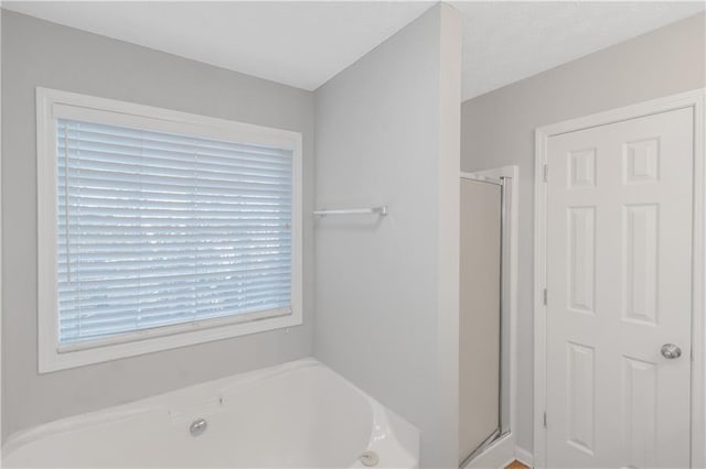 97 Spring Leaf Dr, Dallas, GA 30157 - full bathroom featuring a stall shower and a garden tub