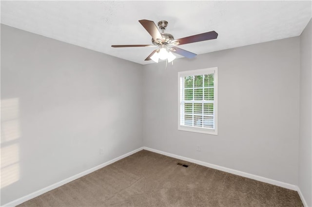 97 Spring Leaf Dr, Dallas, GA 30157 - spare room featuring carpet flooring, visible vents, baseboards, and ceiling fan