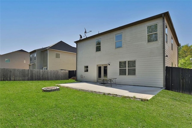 581 Collingsworth Ln, Lawrenceville, GA 30043 - back of house featuring a fire pit and a patio