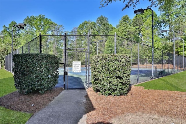 581 Collingsworth Ln, Lawrenceville, GA 30043 - view of tennis court featuring a gate