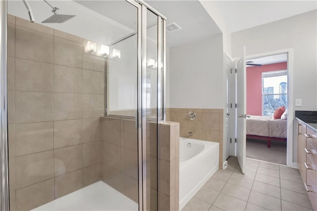 bathroom featuring tile patterned floors and plus walk in shower