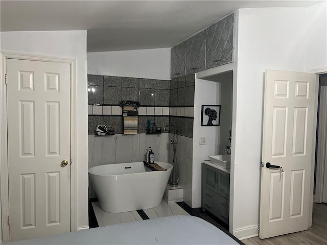 1506 Ravenel Rd, Conley, GA 30288 - bathroom with vanity and a freestanding tub
