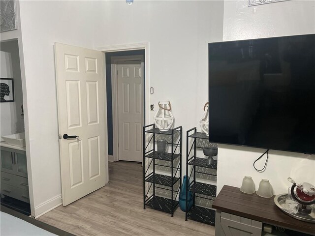 1506 Ravenel Rd, Conley, GA 30288 - hall with light wood-style floors and baseboards