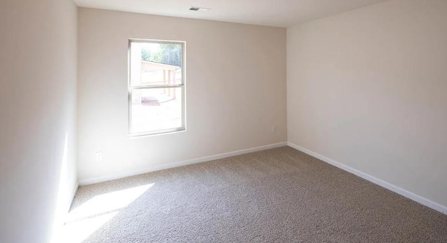 empty room featuring carpet floors