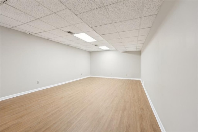 basement featuring wood-type flooring