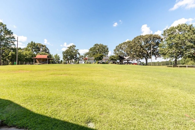 view of green lawn featuring a gazebo