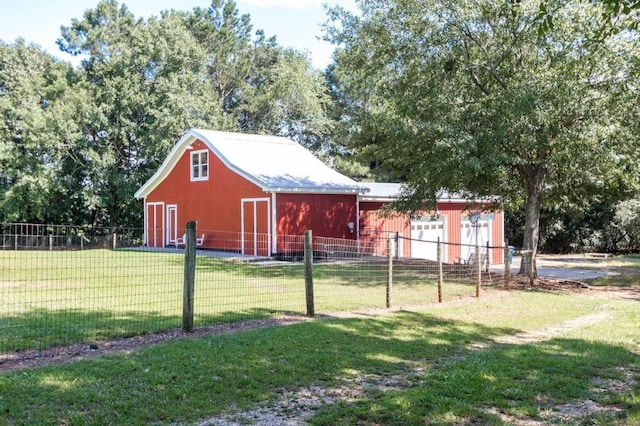 view of barn featuring a garage