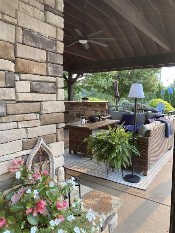 view of patio / terrace featuring an outdoor living space and a ceiling fan