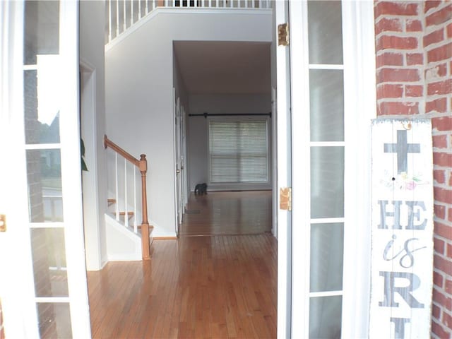 hall featuring hardwood / wood-style flooring