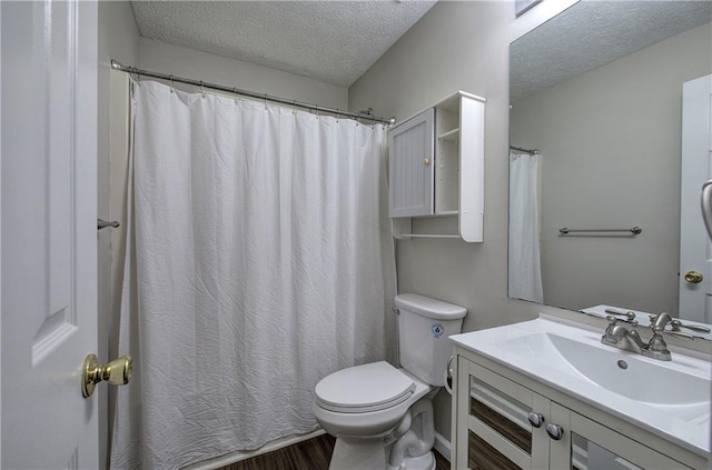 4975 Rockstone Way, Acworth, GA 30101 - full bath with a textured ceiling, vanity, wood finished floors, and a shower with curtain