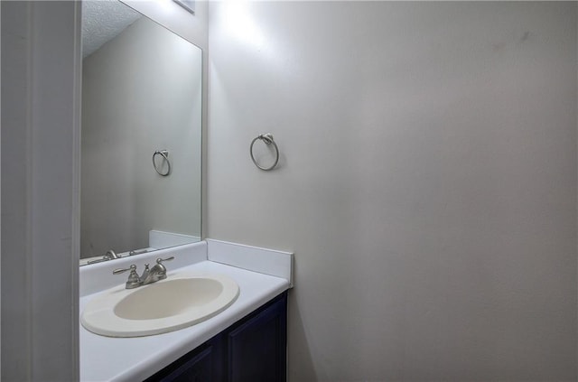 4975 Rockstone Way, Acworth, GA 30101 - bathroom with vanity and a textured ceiling