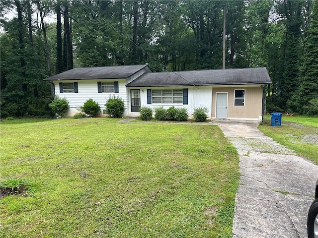 1681 SW Hammond Woods Cir SW, Marietta, GA 30008 - ranch-style home with asphalt driveway and a front lawn