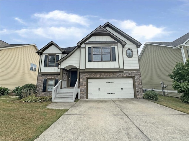 view of front facade with a garage and a front yard