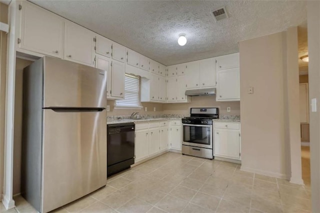 kitchen featuring visible vents, appliances with stainless steel finishes, white cabinets, a sink, and under cabinet range hood