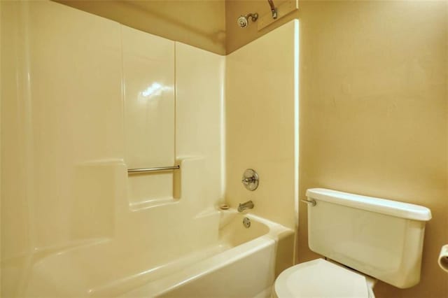 full bathroom with shower / bath combination and toilet