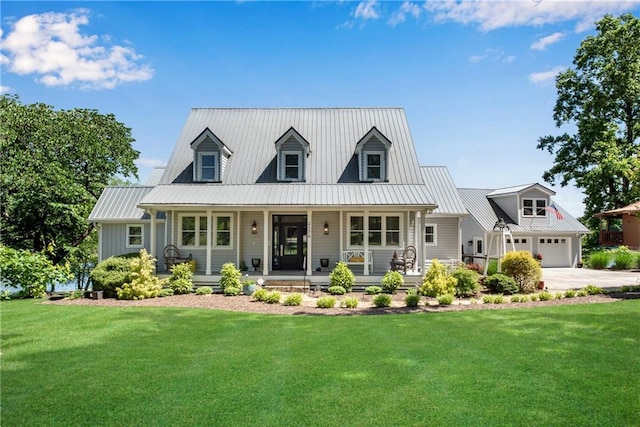 2176 Pine Lake Rd, Hiawassee, GA 30546 - cape cod house featuring metal roof, a front lawn, and covered porch