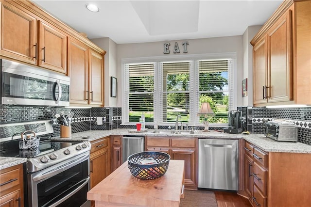 2176 Pine Lake Rd, Hiawassee, GA 30546 - kitchen featuring stainless steel appliances, a sink, tasteful backsplash, healthy amount of natural light, and recessed lighting