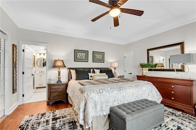 2176 Pine Lake Rd, Hiawassee, GA 30546 - bedroom featuring wood finished floors, ornamental molding, ensuite bath, and a ceiling fan