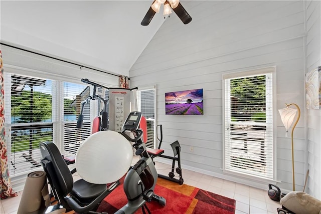 2176 Pine Lake Rd, Hiawassee, GA 30546 - exercise room featuring light tile patterned flooring, healthy amount of natural light, ceiling fan, wood walls, and high vaulted ceiling