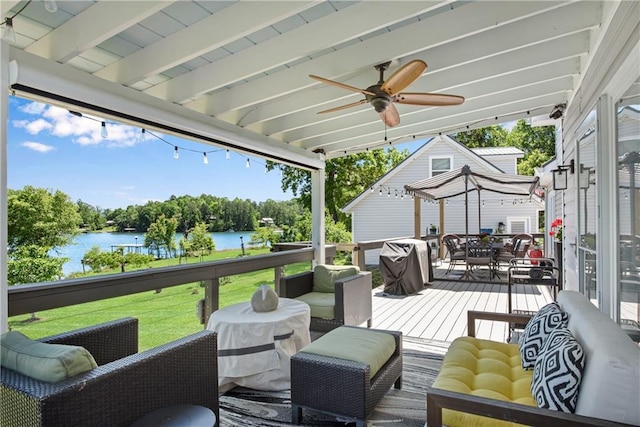 2176 Pine Lake Rd, Hiawassee, GA 30546 - wooden deck with a water view, a ceiling fan, an outdoor living space, a yard, and outdoor dining space