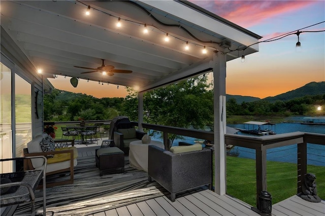 2176 Pine Lake Rd, Hiawassee, GA 30546 - deck at dusk with ceiling fan and a mountain view