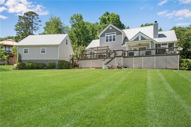 2176 Pine Lake Rd, Hiawassee, GA 30546 - rear view of house with a chimney, a yard, a deck, and metal roof