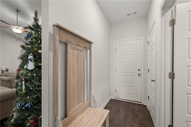 hall with dark wood-type flooring