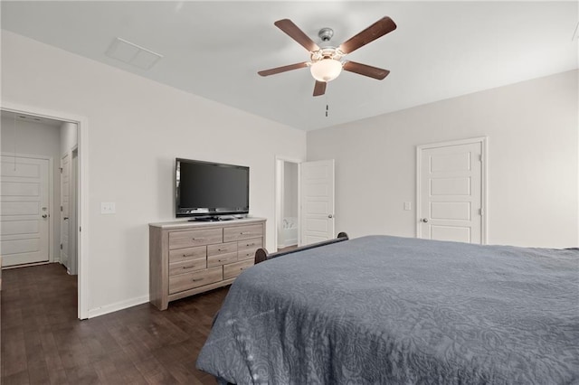 bedroom with dark hardwood / wood-style floors and ceiling fan