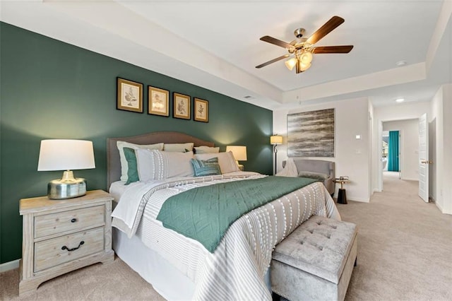 353 Sound Cir, Stockbridge, GA 30281 - bedroom featuring a ceiling fan, baseboards, carpet, and a raised ceiling