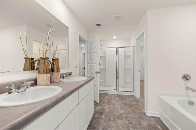 353 Sound Cir, Stockbridge, GA 30281 - bathroom with baseboards, stone finish flooring, a stall shower, and a sink