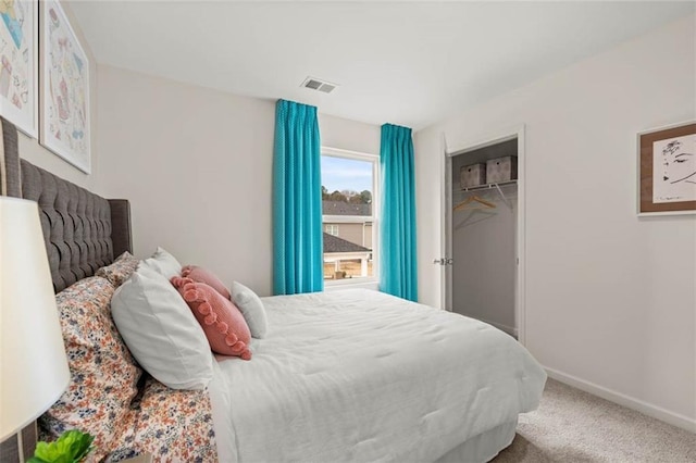 353 Sound Cir, Stockbridge, GA 30281 - bedroom with a closet, carpet, visible vents, and baseboards