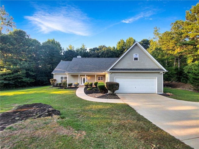 view of front of property with a front lawn and a garage